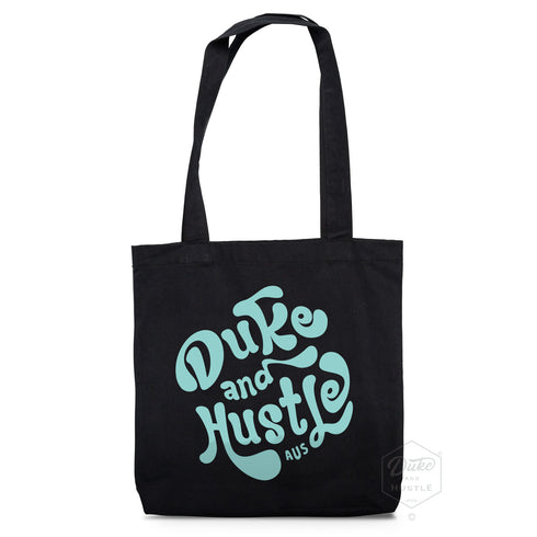 Typographic Tote "The Daydreamer," aqua colour on black premium cotton